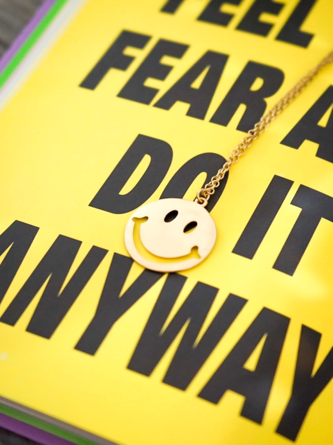 gold smiley face necklace