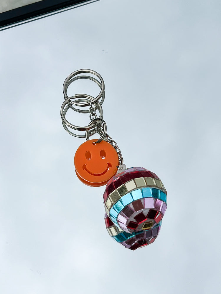 Rainbow Disco Orange Smiley Keychain