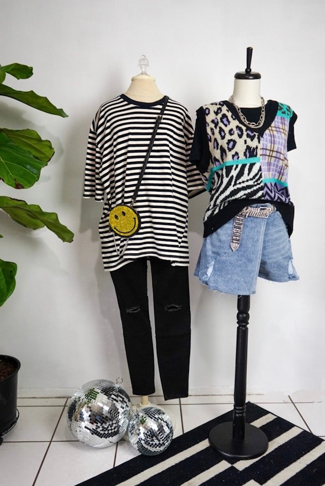 two trendy outfits on mannequin