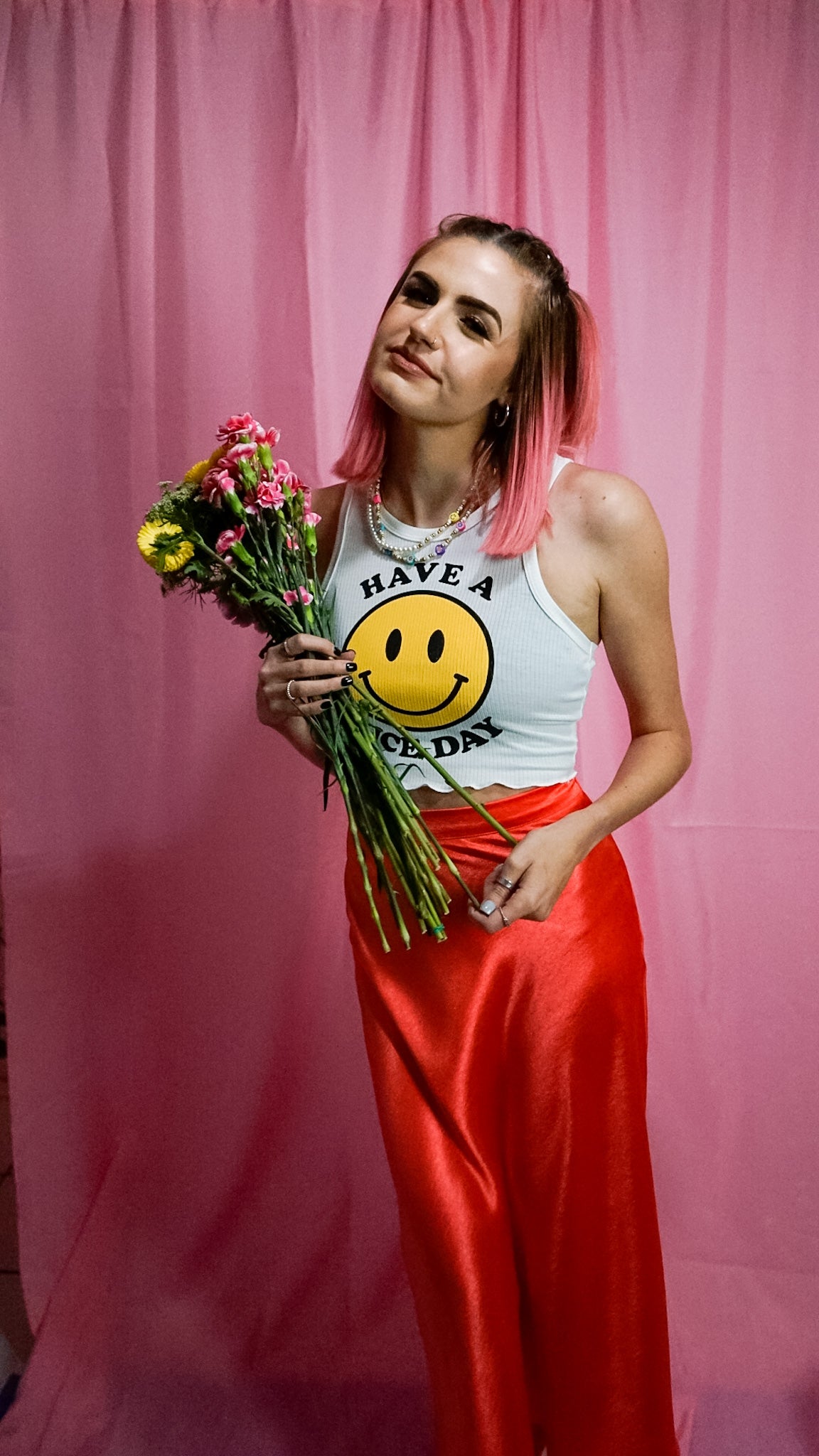 have a nice day smiley face tank top with red satin midi skirt 